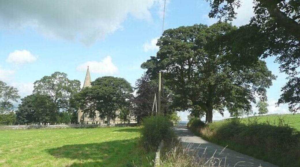 The lane to Bell Busk, Coniston Cold The church is at the top of the rise (why is this called 'Hospital Hill'?), and then the lane drops down to Gill Syke and the River Aire at Bell Busk.