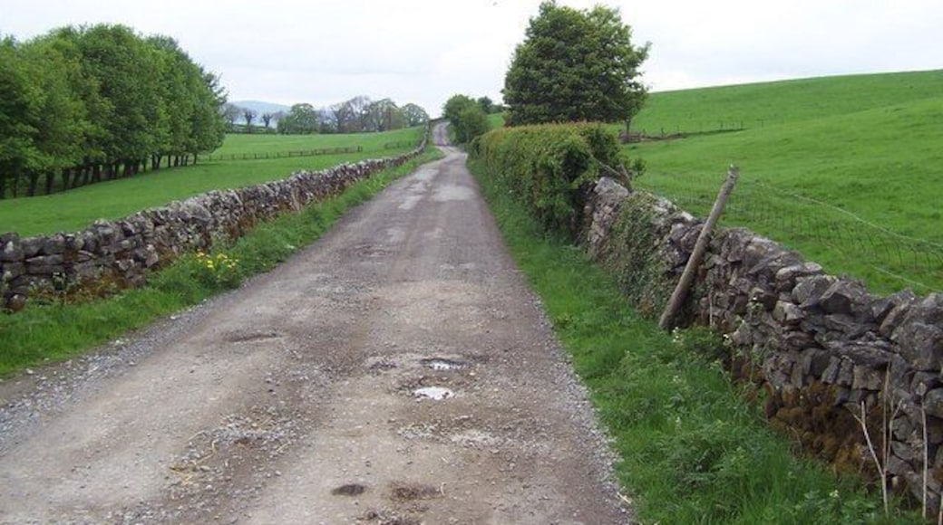 Moorber Lane. Unmetalled lane that swings under a green hill of the same name, en route from Stainton Cotes to Coniston Cold