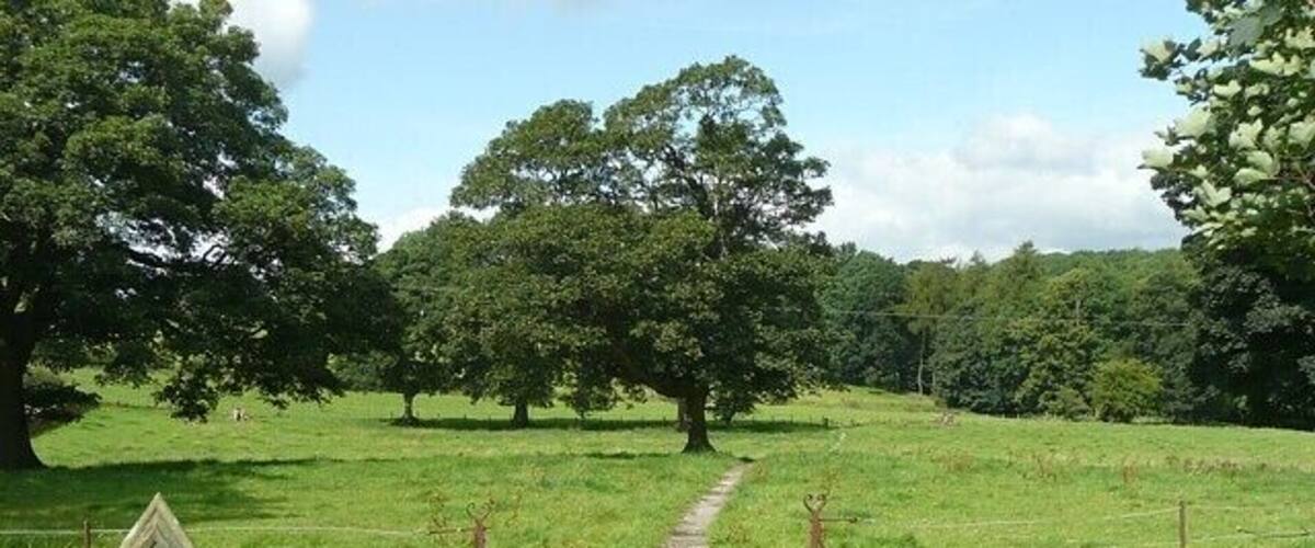 Rear gate of St Peter's Churchyard, Coniston Cold. This is part of a set of memorial gates - see 1437107. The flagged path leads to a public footpath from Gill Syke southwards to the main road.