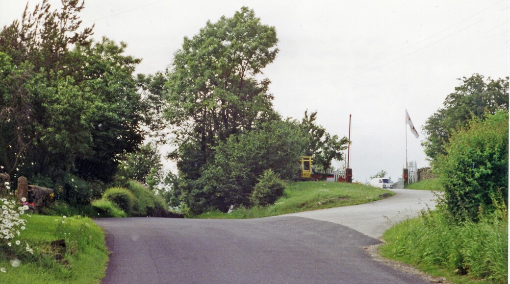 Site of former Elslack station, 1996. View NW at bridge over the course of the ex-Midland Skipton (to right) - Colne (to left) line, a useful cross-Pennine connecting line. The station had been below on the right and was closed as long ago as 3/3/52, but the line survived until 2/2/70.