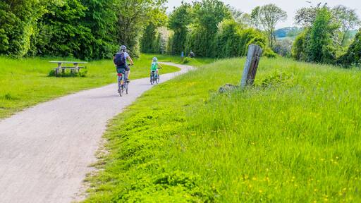 People walking and riding bicycles. Greenway hiking and cycling trail Stratford upon Avon Warwickshire England UK