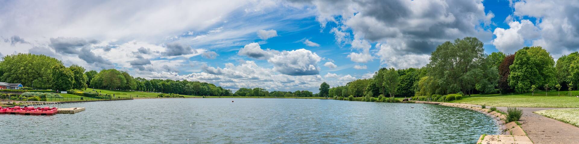 Sailing lake panorama in Fairlands Valley Park. Stevenage, UK