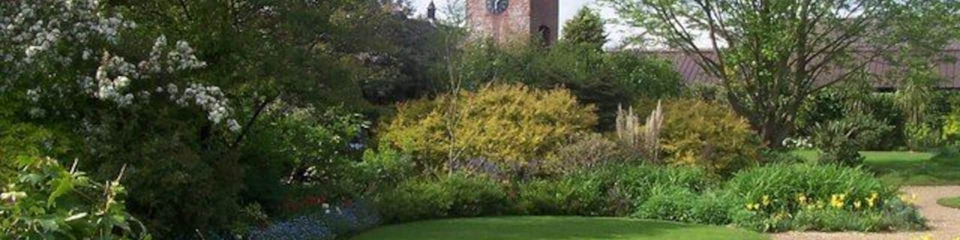 Towards the Clock House, in Denmans Garden Looking north.