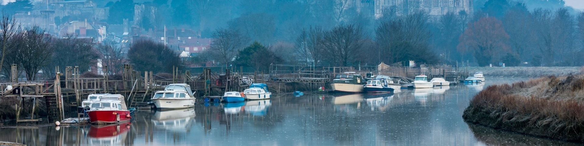 Sunrise view of Arundel Castle from the banks of the River Arun