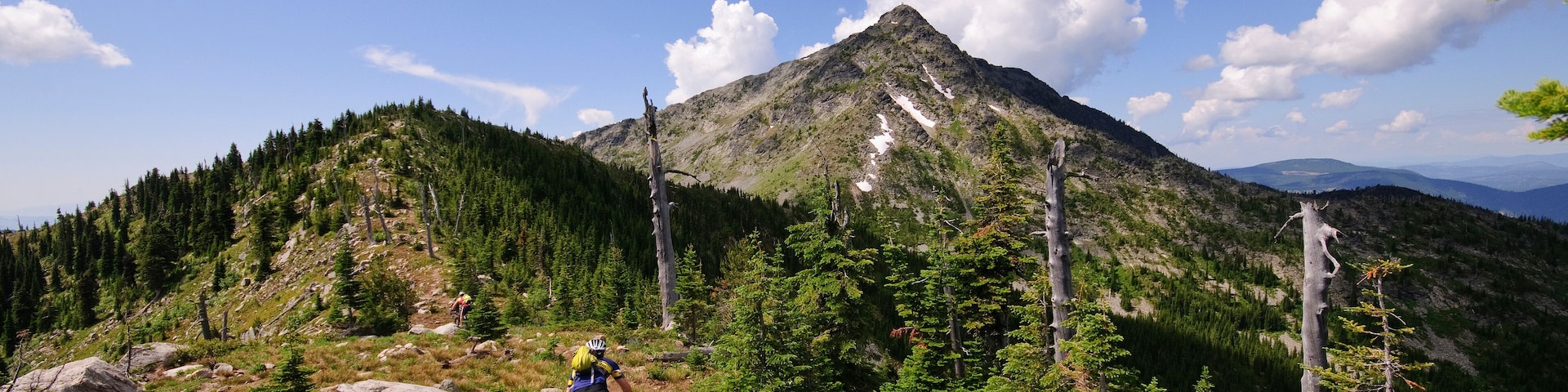 Mountain biking along the Seven Summits trail in Rossland. Kootenay Rockies region, British Columbia, Canada