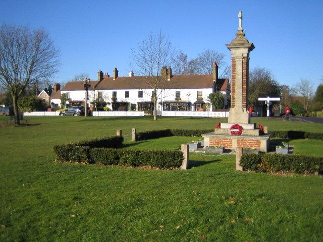 Chipperfield: War Memorial & The Two Brewers. Viewed looking westwards across Chipperfield Common, The Two Brewers has its own website here http://www.twobrewers.com/ The village sign on the common is just visible to the left.