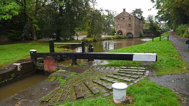 Marple Flight Locks and Lockside Mill Cheshire England.