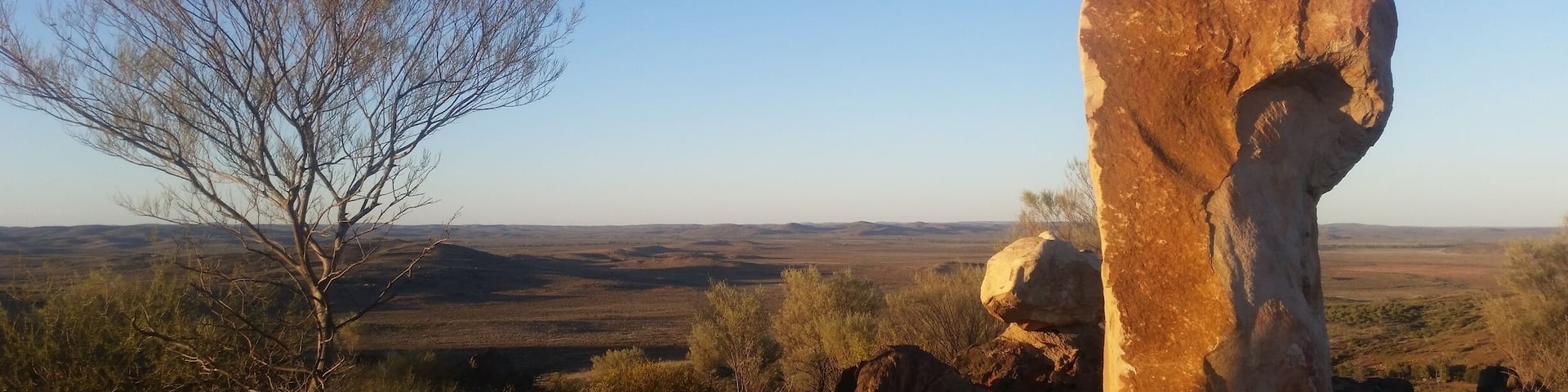 A summer sunset taking in the vast skies and impeccable colours of the outback