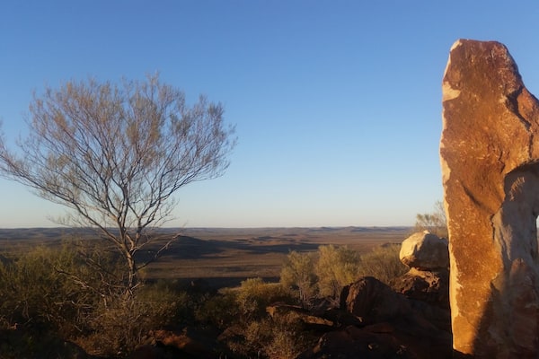 A summer sunset taking in the vast skies and impeccable colours of the outback