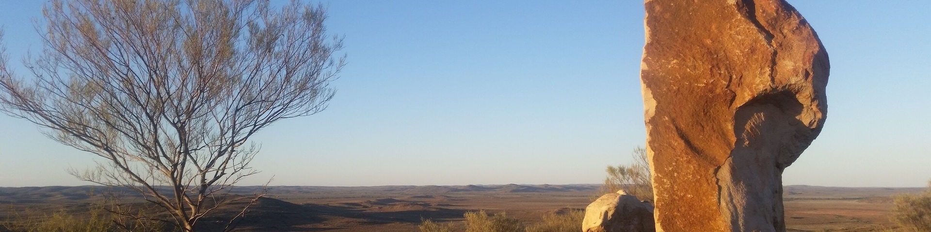A summer sunset taking in the vast skies and impeccable colours of the outback