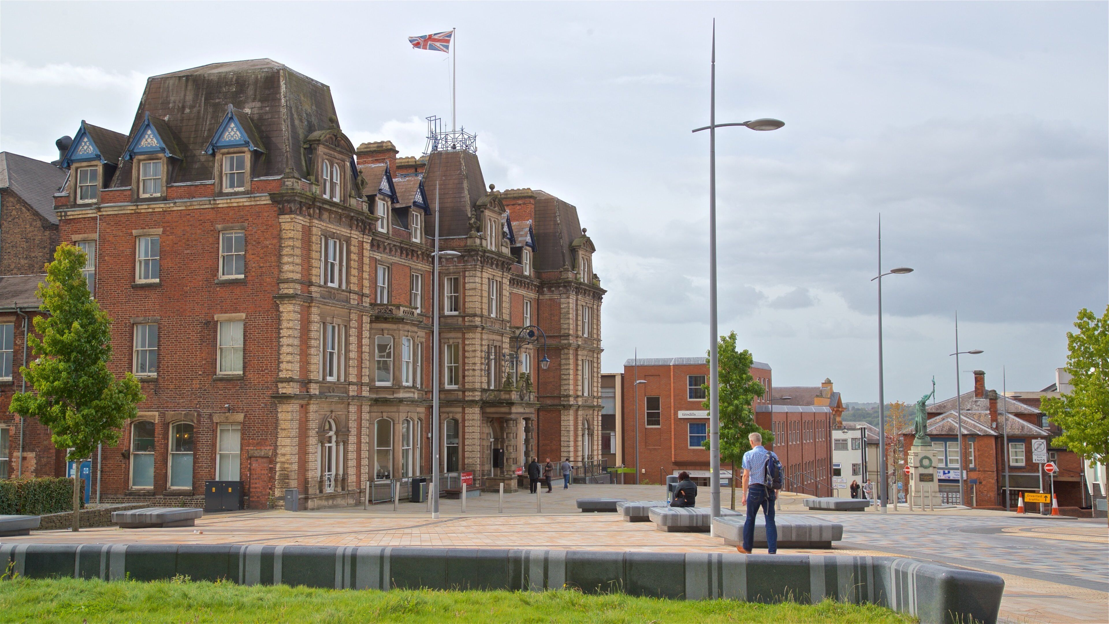 Stoke-on-Trent das einen Straßenszenen und Geschichtliches sowie einzelner Mann