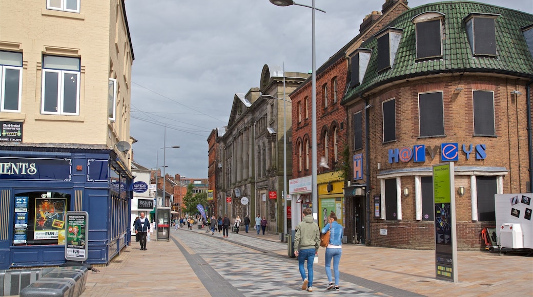 Stoke-on-Trent showing street scenes as well as a couple