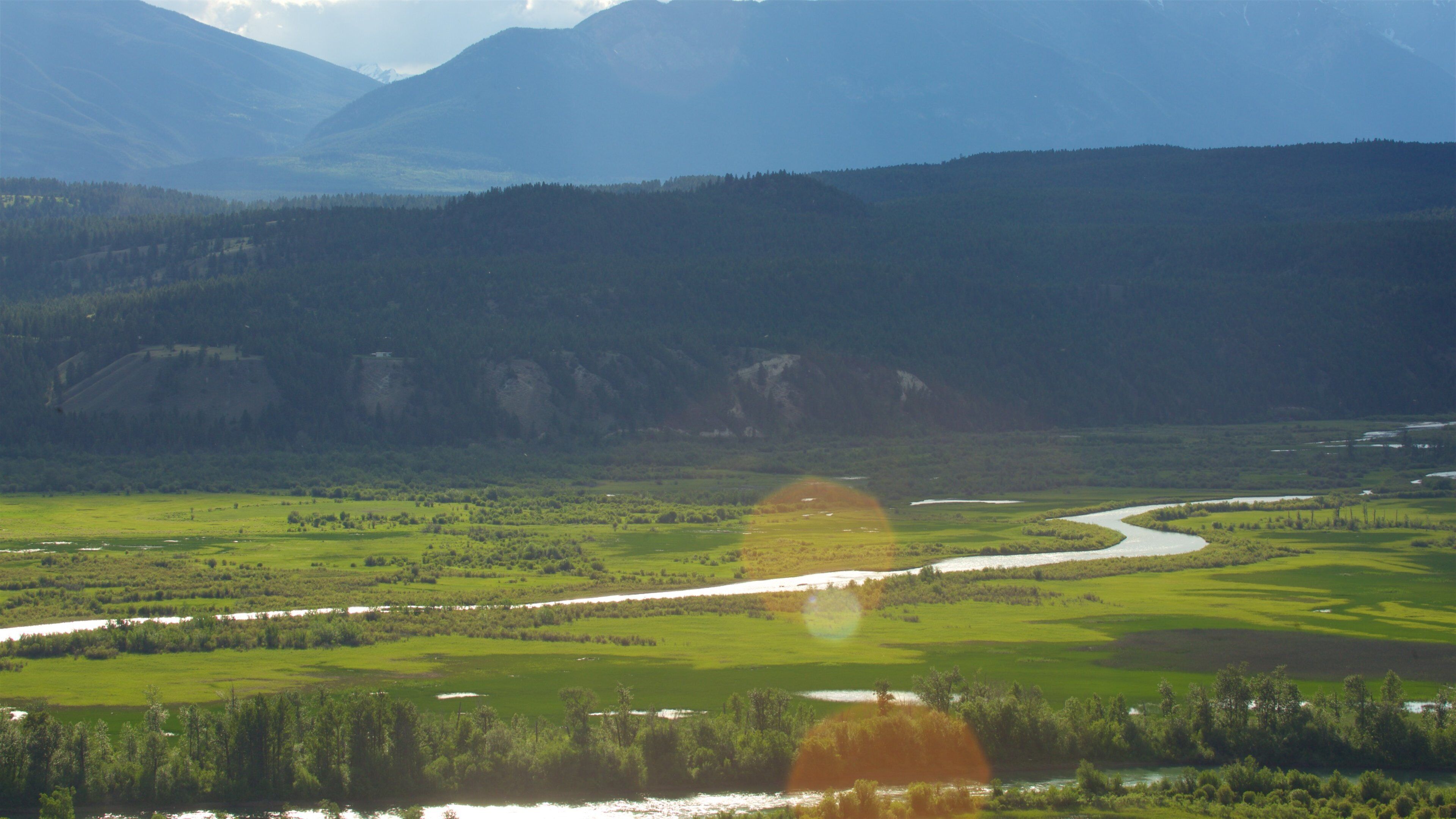 Radium Hot Springs which includes landscape views, a river or creek and tranquil scenes