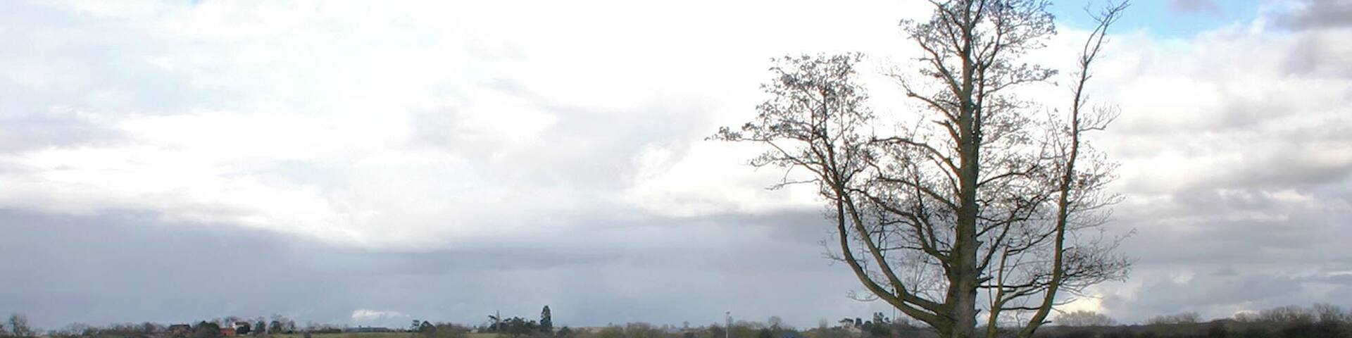View across the Avon from School Lane Looking NNE across the River Avon from next to the slipway at the end of School Lane.