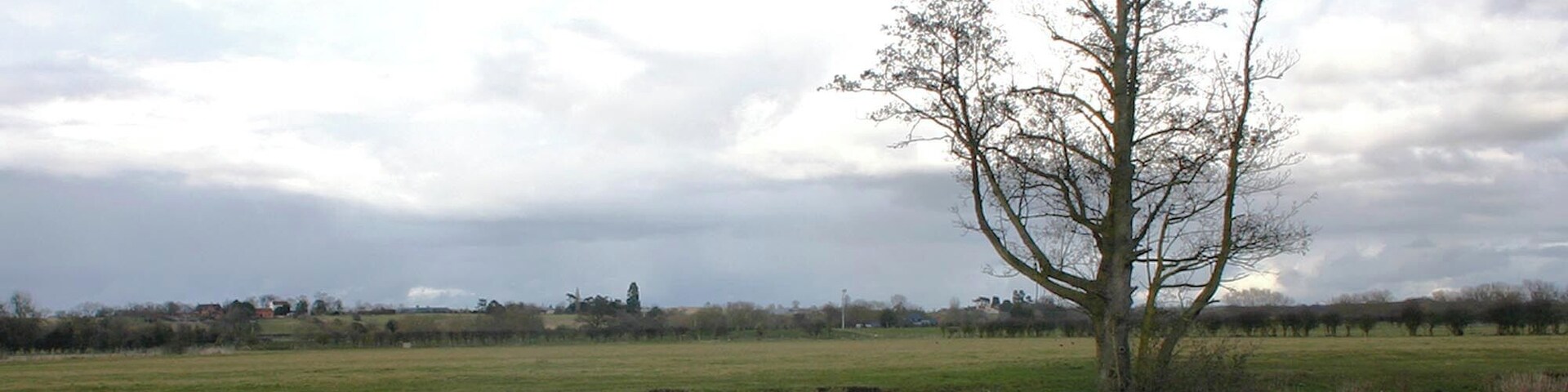 View across the Avon from School Lane Looking NNE across the River Avon from next to the slipway at the end of School Lane.