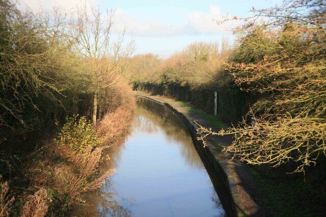 Stratford on Avon canal Looking from the road bridge at Wilmcote north at the canal and towpath.