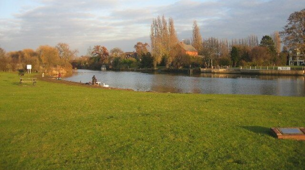 The Old Bathing Place, River Avon. According to a nearby sign this widening of the River Avon has long been an aquatic playground for natives (of Stratford-upon-Avon) and visitors alike. In the mid 1930s diving boards, a chute, changing huts and a floating safety boom were installed. Bathing suits were offer for hire (wholesale gentlemen's £1:6:0d (£1.30) per dozen and ladies' £1:12:6d (£1.625)). Those facilities survived the war but in the 1950s whispers of polio brought about their demise.
