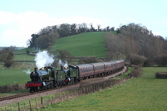 Sampford Brett: train approaching Williton. 7800 Class 7802 Bradley Manor and 5101 Class 4160.