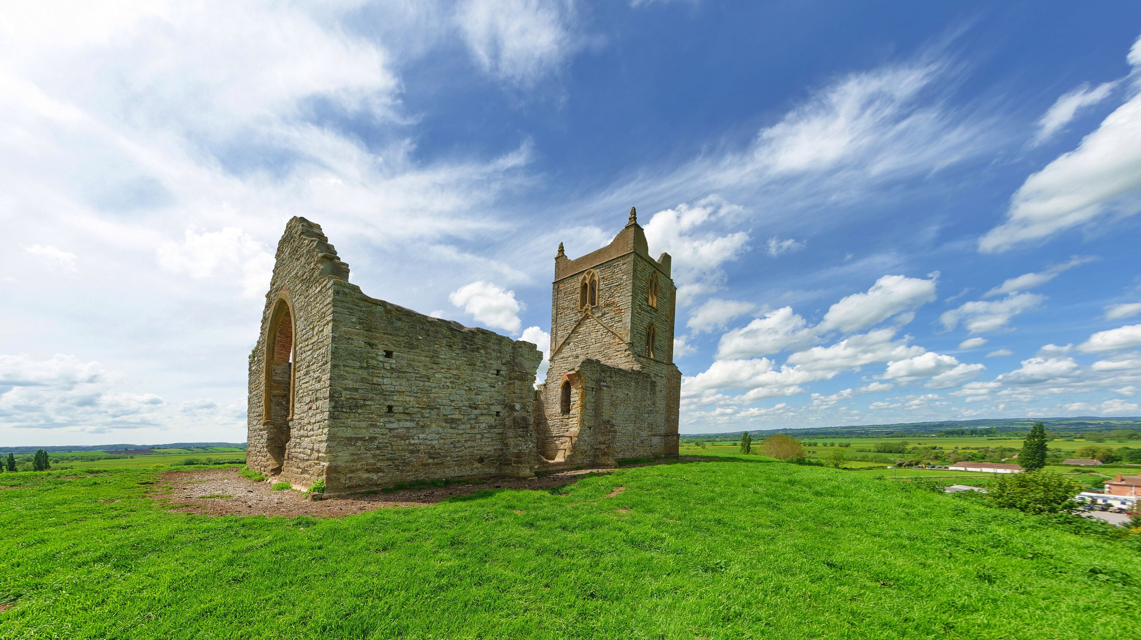 The ruins of St Michaels church on Burrow Mump is a historic site overlooking Southlake Moor in Burrowbridge Taunton Somerset, England
