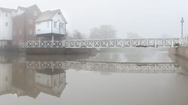 Abbey Mill Tewkesbury - A misty morning adding mood and drama to the scene in this panorama looking across Mill Avon capturing the cottages, mill and their reflections..