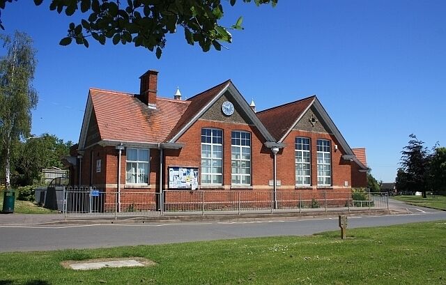 Twyning school The left hand gable end is inscribed "Twyning Council School". Beautifully located on the corner of the green. Google shows the public records go back to 1875 and that it was formerly called the "National School"