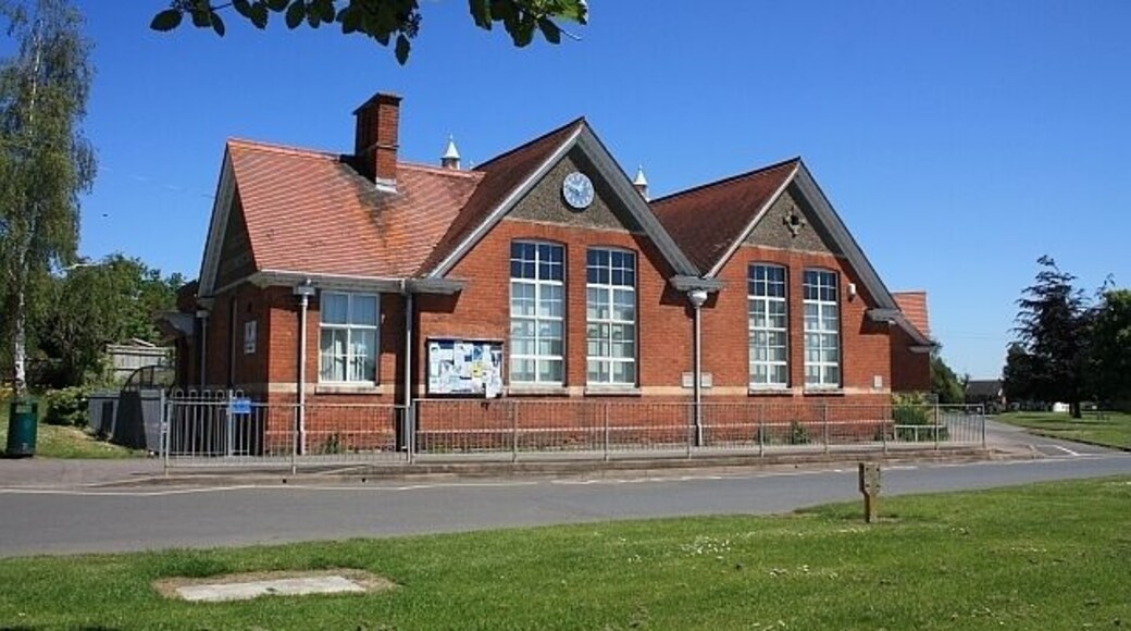 Twyning school The left hand gable end is inscribed "Twyning Council School". Beautifully located on the corner of the green. Google shows the public records go back to 1875 and that it was formerly called the "National School"