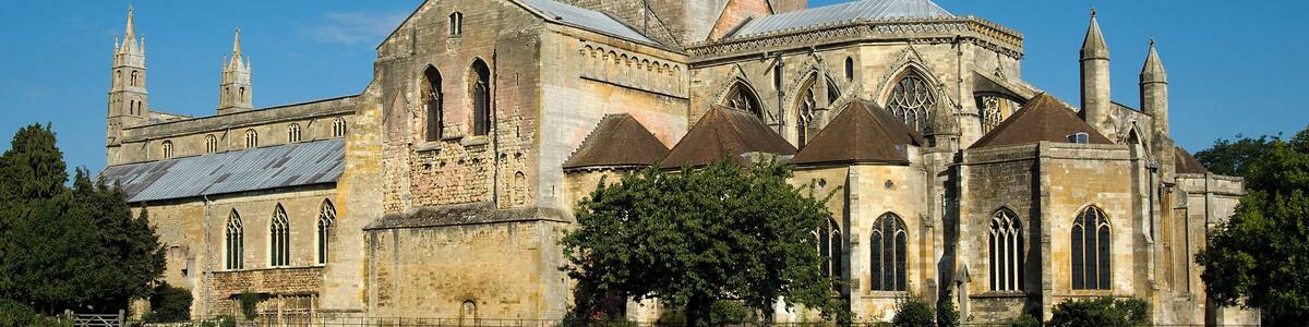 Tewkesbury Abbey was founded in 1087; however, building of the present structure seen here did not start until 1102. Built to house Benedictine monks, the Abbey was was consecrated in 1121 (Norman era).