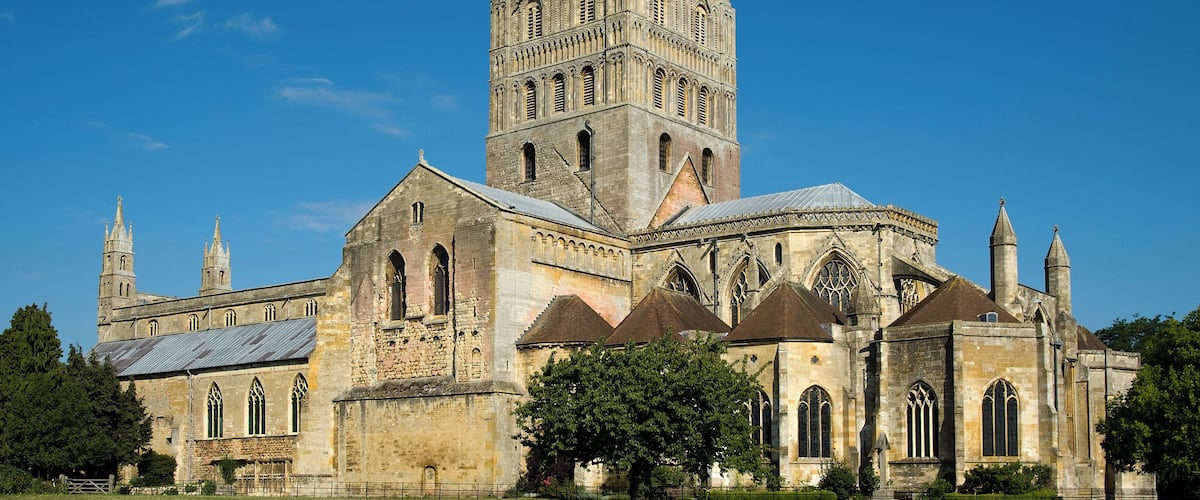 Tewkesbury Abbey was founded in 1087; however, building of the present structure seen here did not start until 1102. Built to house Benedictine monks, the Abbey was was consecrated in 1121 (Norman era).