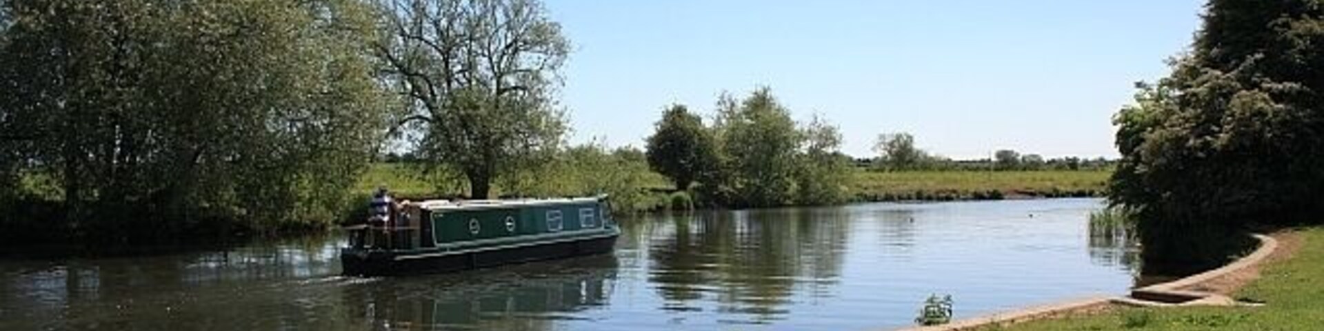 Narrow boat on the River Avon at Twyning Taken from the public access point next to the Fleet Inn (from beneath a flowering cherry tree) where the ferry crossed the river.