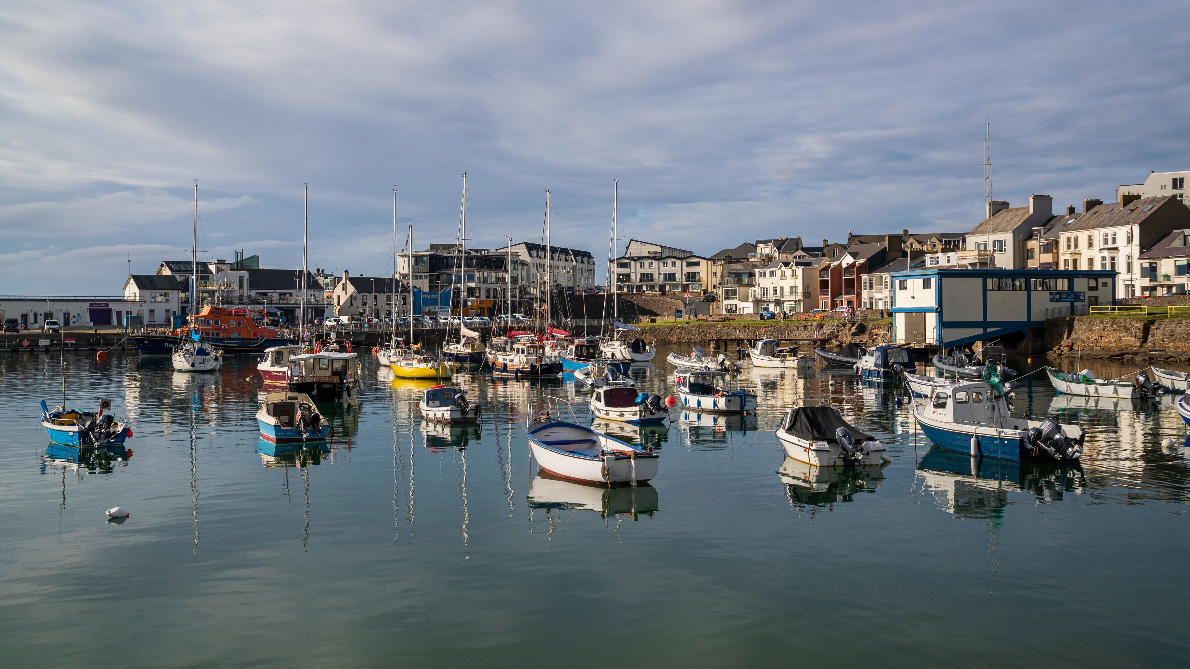 Portrush featuring a bay or harbor
