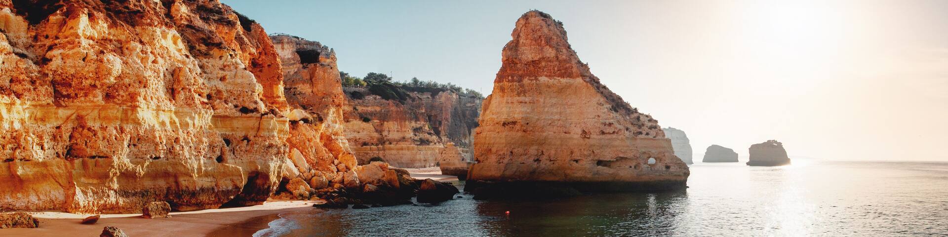 One of the must visit spot at the famous coastline with rocks and beautiful beaches at sunset light Praia da Marinha, Famous Beach, Algarve Coast, Lagoa, Portimao in South Portugal, Atlantic Ocean