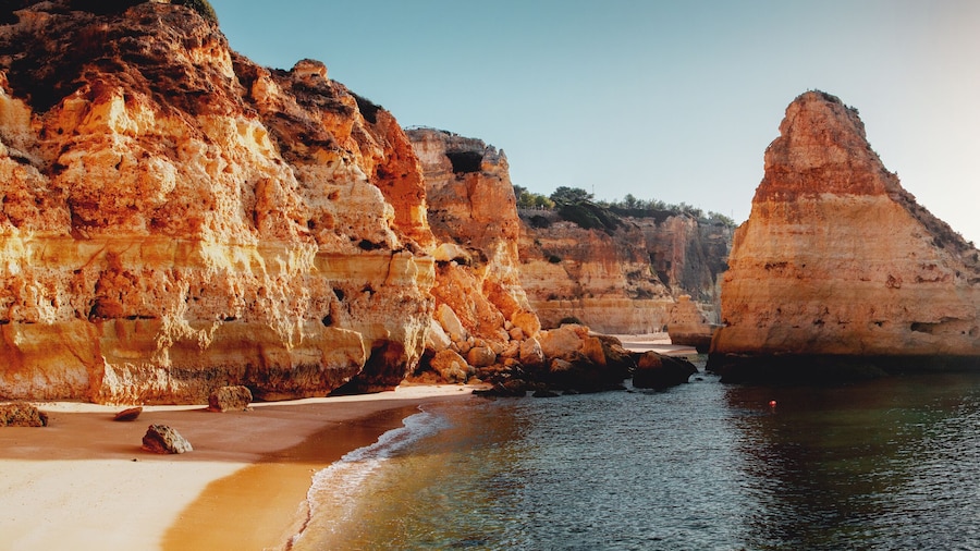 One of the must visit spot at the famous coastline with rocks and beautiful beaches at sunset light Praia da Marinha, Famous Beach, Algarve Coast, Lagoa, Portimao in South Portugal, Atlantic Ocean