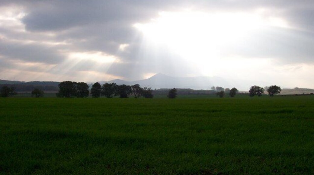 Bennachie Mount Bennachie Mount in the far distance over the fields. There has been a lot of Roman activity here in the past.