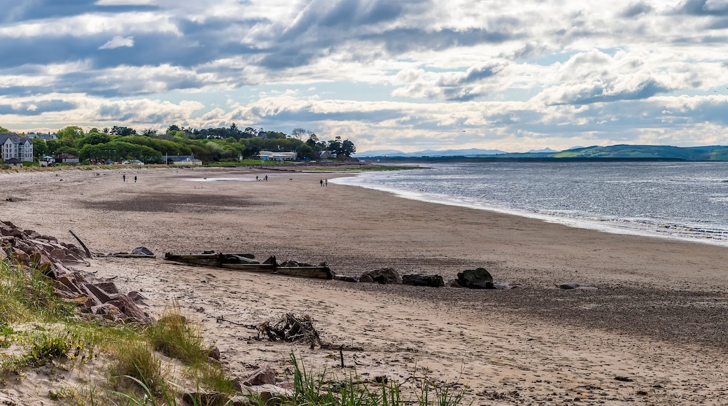 A panorama view along the beach at Nairn, Scotland on a summers evening