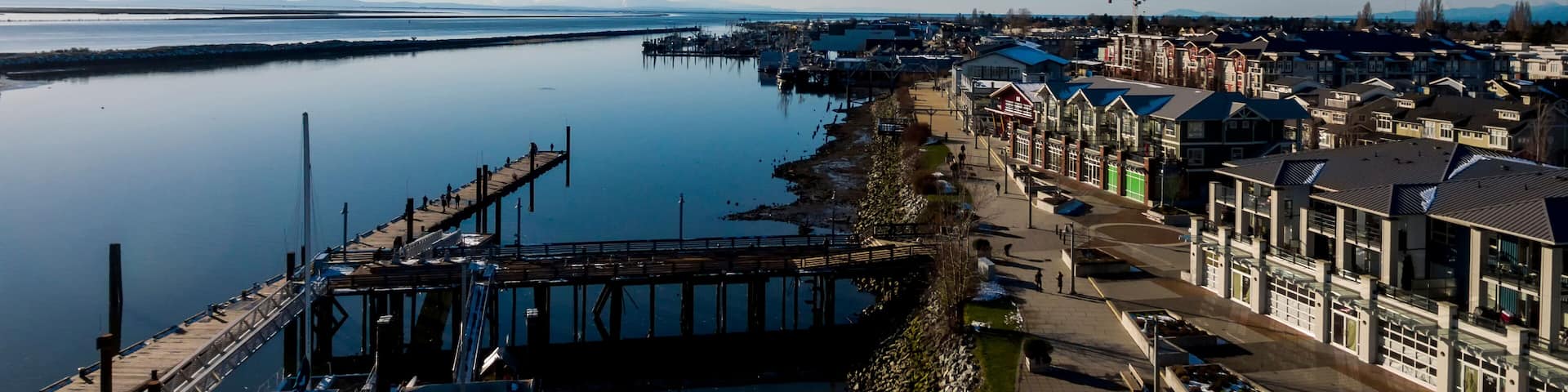 Steveston Waterfront Boardwalk Aerial on the Fraser River - Richmond, BC, Shutterstock ID 1051415375, Purchase Order: SP-1506 Go Guides, Order Number: , Client/Licensee: Faa Praharnpap, Other: Hcom bu