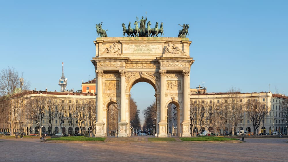 The Arc of Triumph in Rome, Italy, with classical statues and inscriptions.