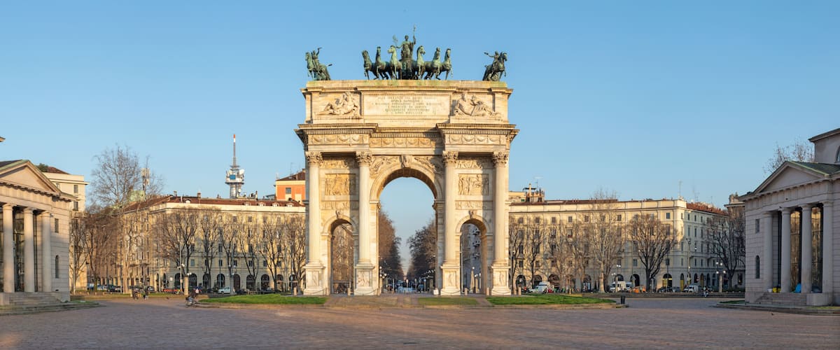 The Arc of Triumph in Rome, Italy, with classical statues and inscriptions.