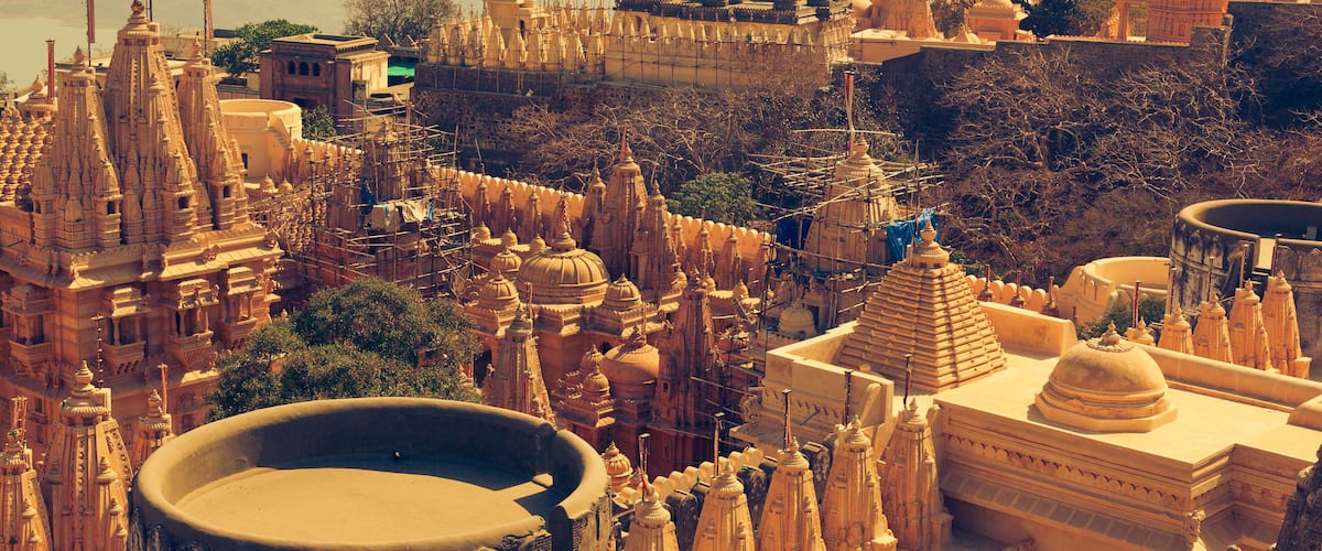 A detailed view of a temple complex with multiple spires and intricate architecture.