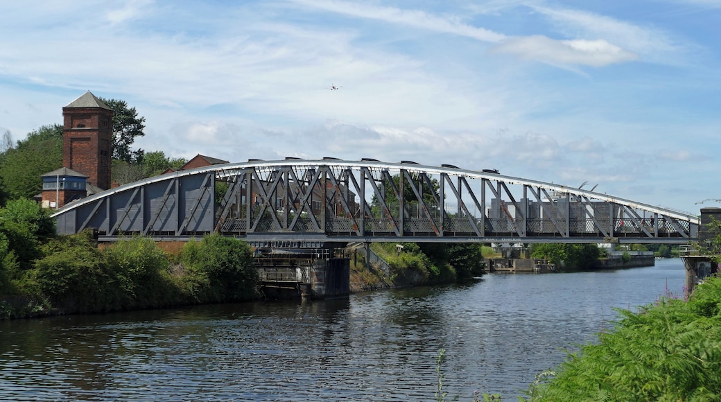 The Old Quay Bridge, in Runcorn, is one of several similar swing bridges along the Manchester Ship Canal. It was built circa 1894 and still functions.