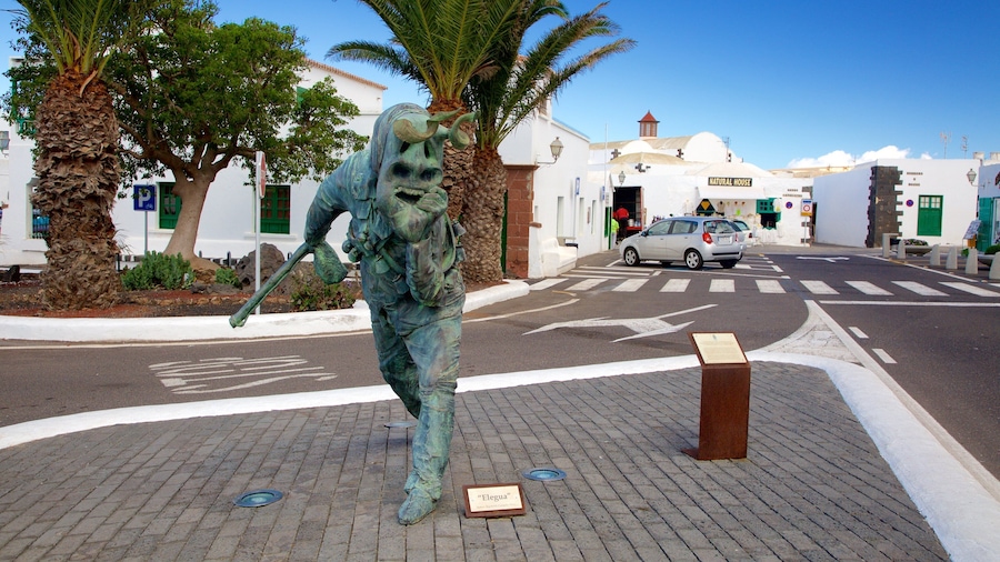 Teguise featuring a statue or sculpture and a city