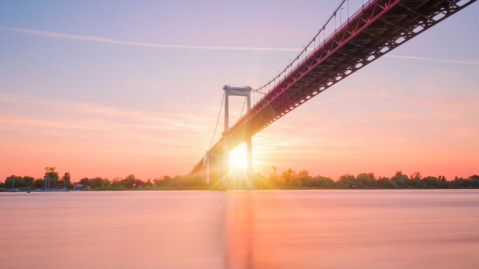 View of Pont d'Aquitaine bridge during sunset