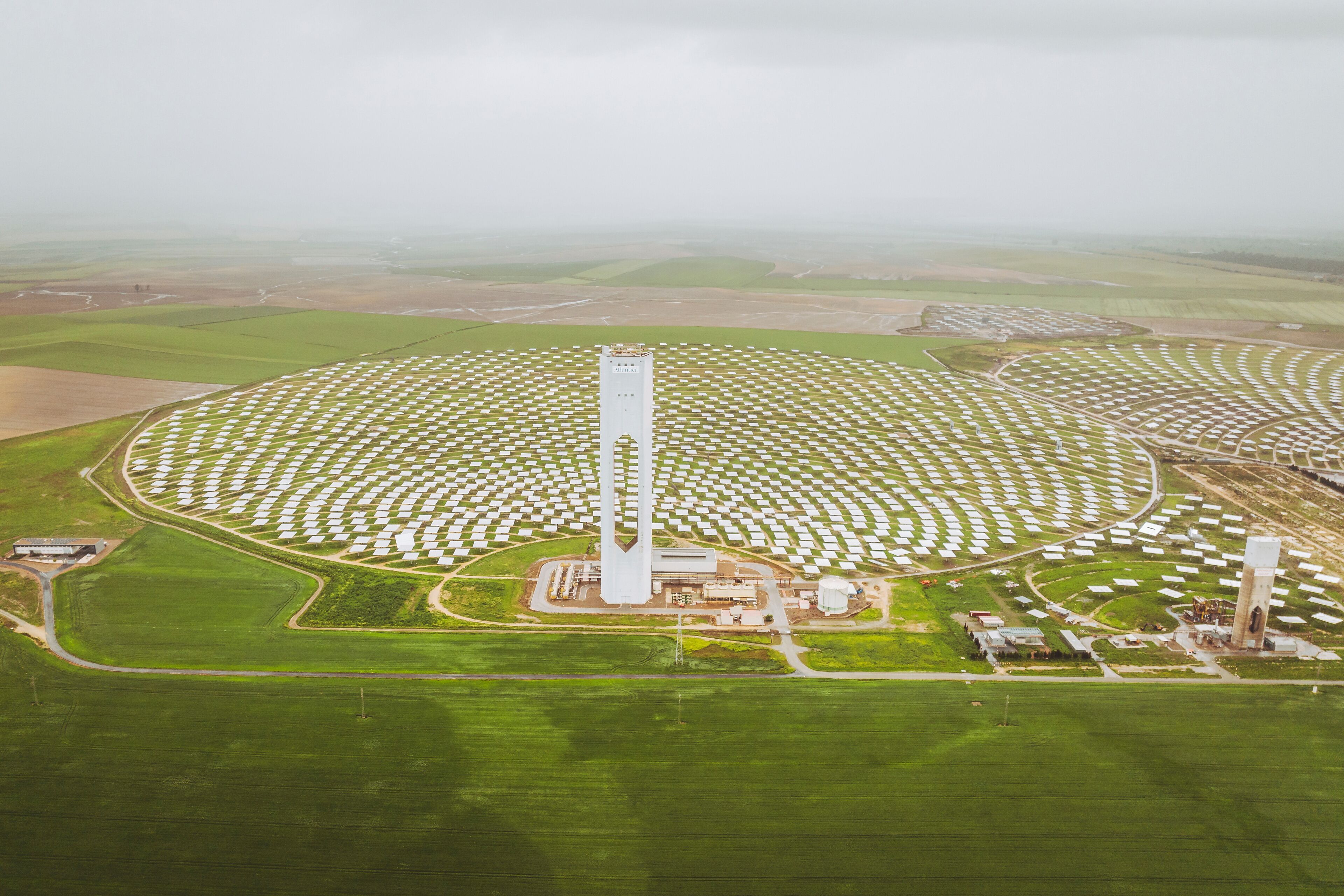 Aerial view of Solar Power Plant PS20 with Tower and Solar Panels, Sanlucar la Mayor, Spain.