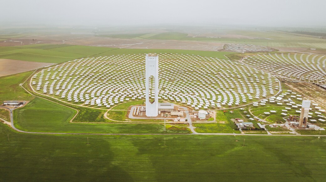 Aerial view of Solar Power Plant PS20 with Tower and Solar Panels, Sanlucar la Mayor, Spain.