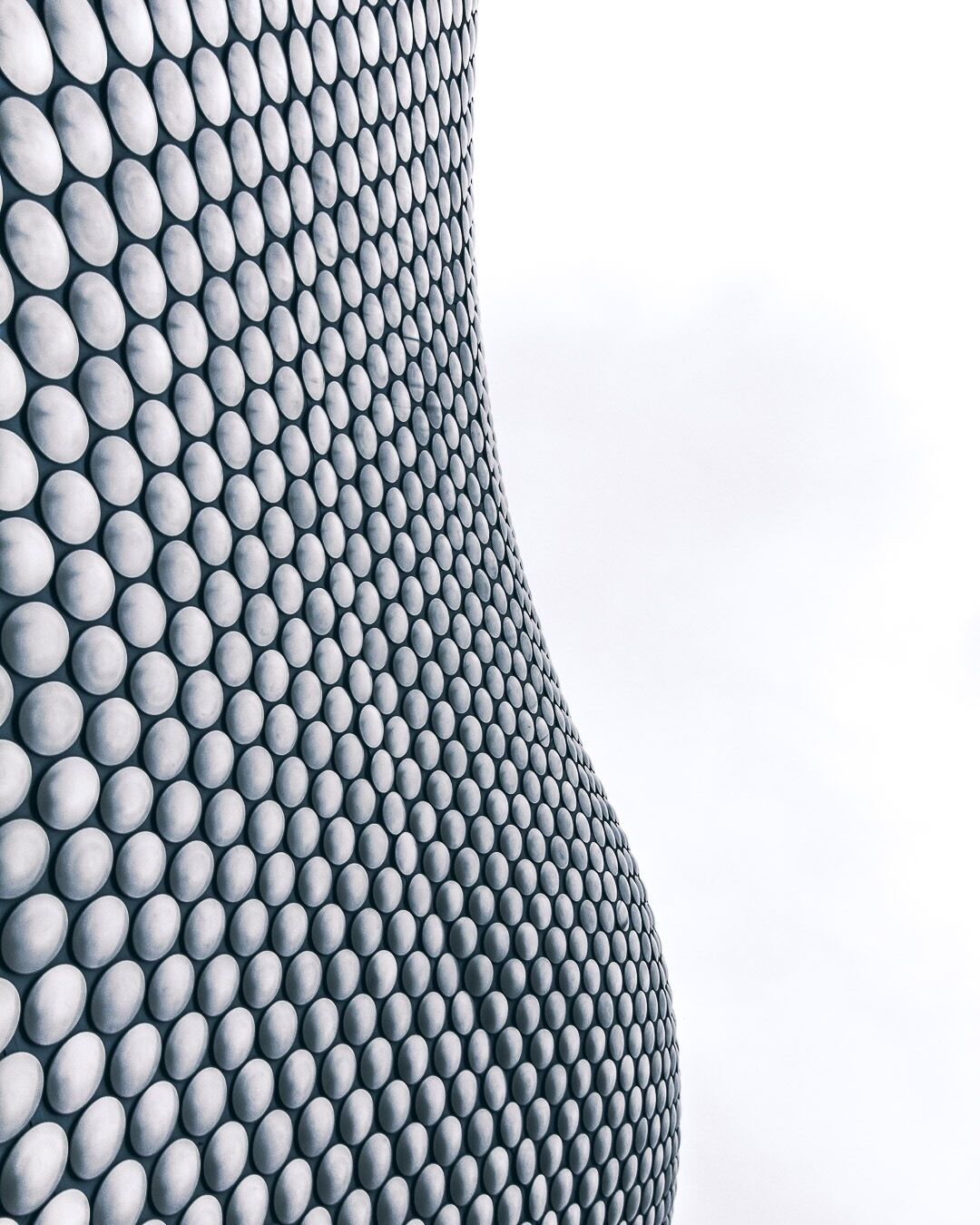 Not So trypophoba-friendly I’m afraid. 

A part of the Bullring Shopping Centre outside Selfridges in Birmingham, UK. 