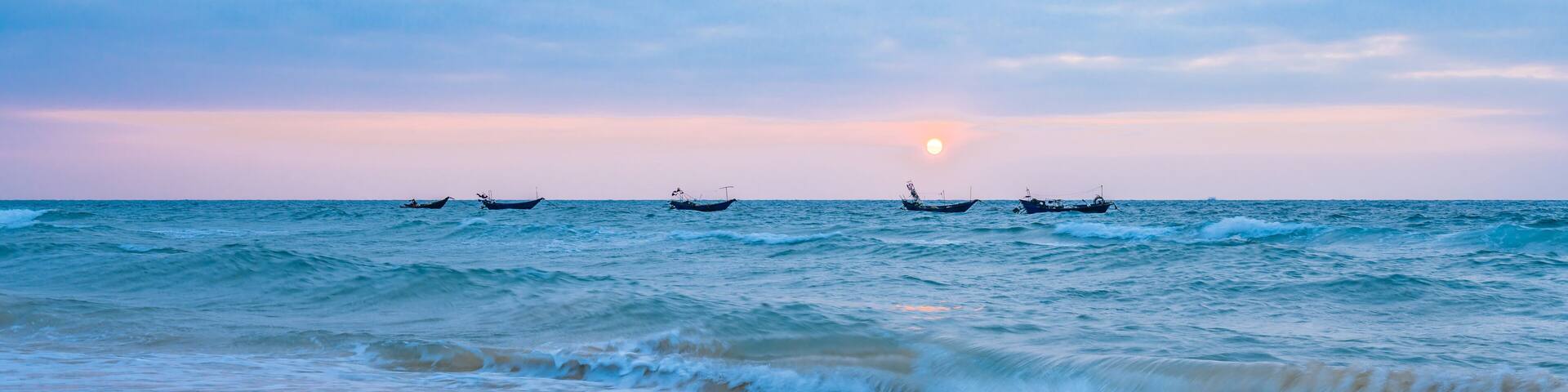 Swaying boat in the sea on Weizhou Island, Beihai, Guangxi, China