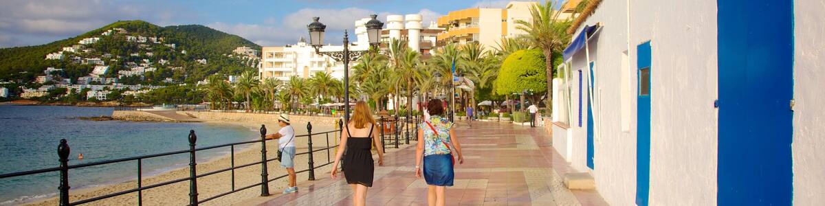 Santa Eulalia del Rio featuring a luxury hotel or resort, a sandy beach and street scenes
