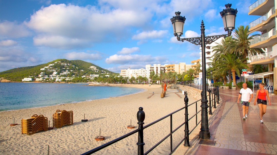 Ibiza Island which includes general coastal views, a coastal town and a sandy beach