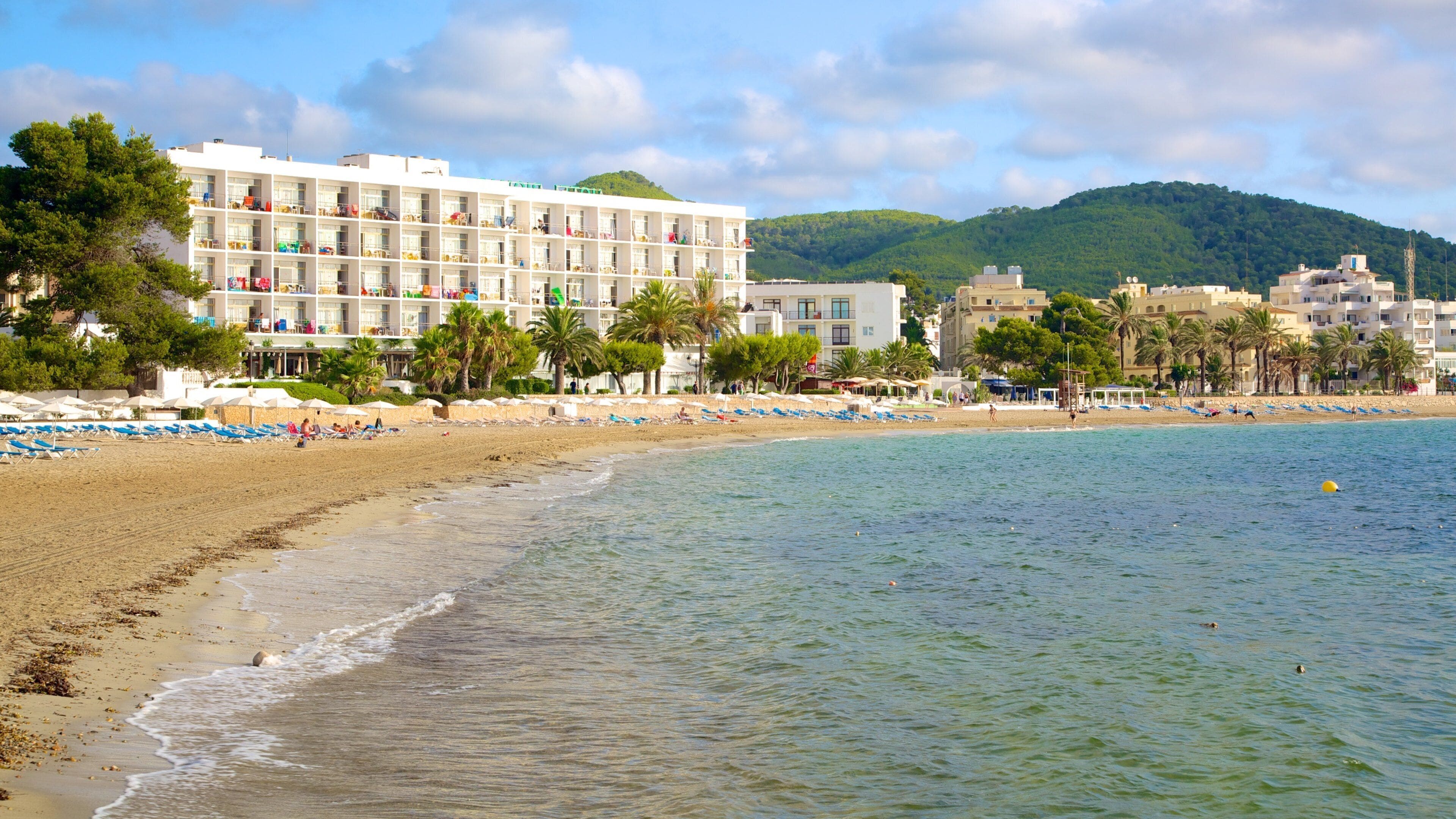 Santa Eulalia del Rio which includes a luxury hotel or resort and a sandy beach