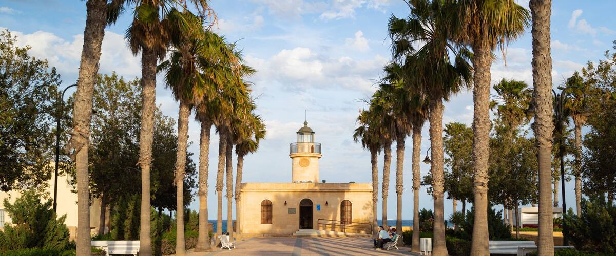 Roquetas de Mar which includes a lighthouse and a coastal town