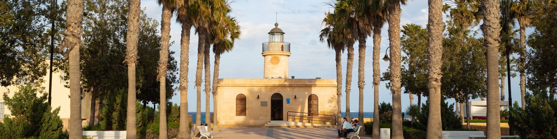Roquetas de Mar which includes a lighthouse and a coastal town